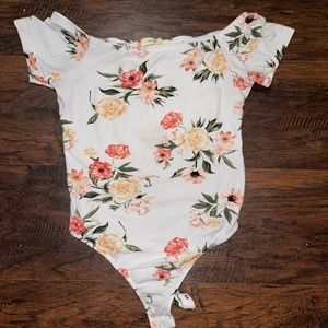 A beautiful flower shirt. It buttons down.